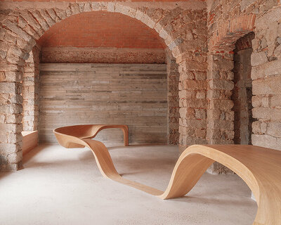 amelia tavella's curvilinear furniture-sculpture hybrid twists from seat to desk