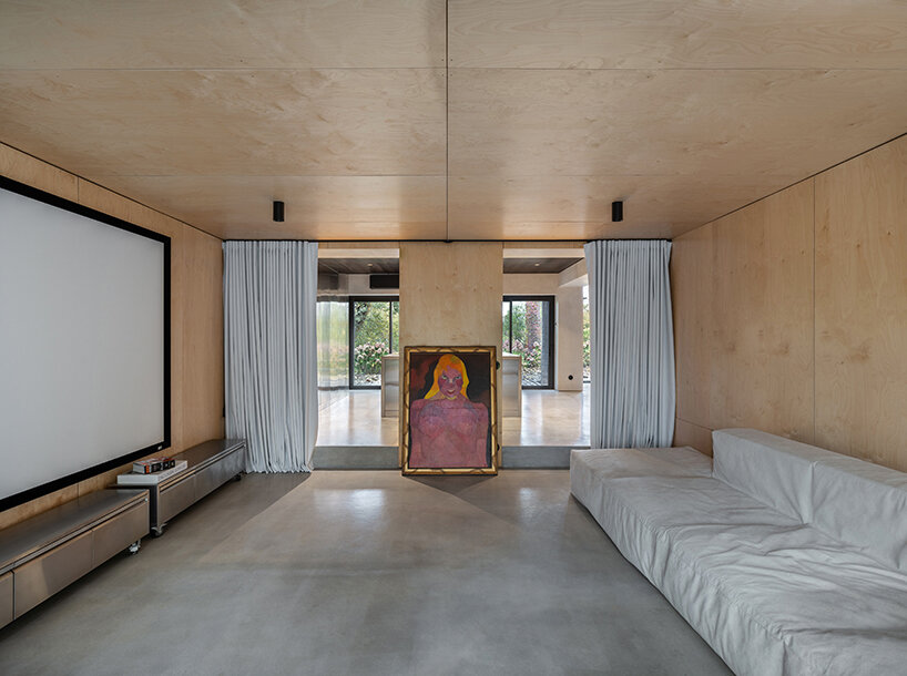 balbek bureau's relogged house in ukraine is a modern take on the classic log cabin
