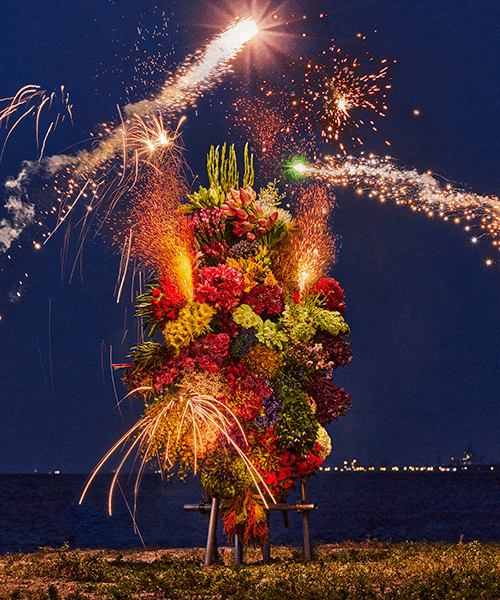 azuma makoto's botanical sculpture blossoms amidst colorful fireworks