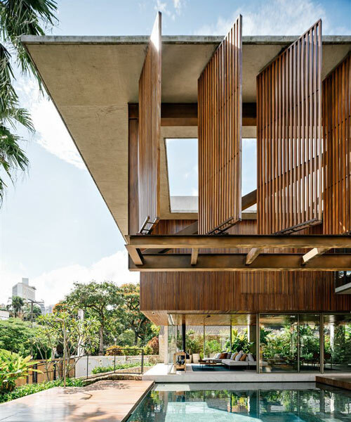 delicate timber shutters shade FGMF arquitetos' 'casa cumaru' in são paolo