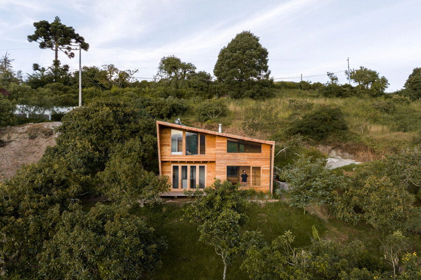 uniform skin of bricks coats casa perucho's facades in ecuador