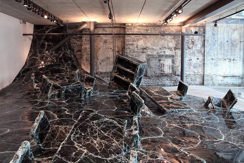 dark tide: baptiste debombourg's broken black glass installation