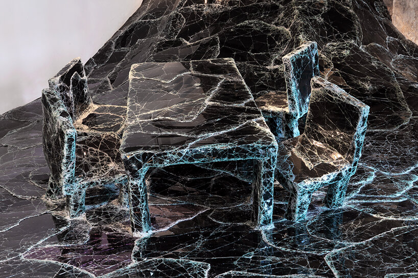dark tide: baptiste debombourg recreates a magma flow disaster using broken black glass