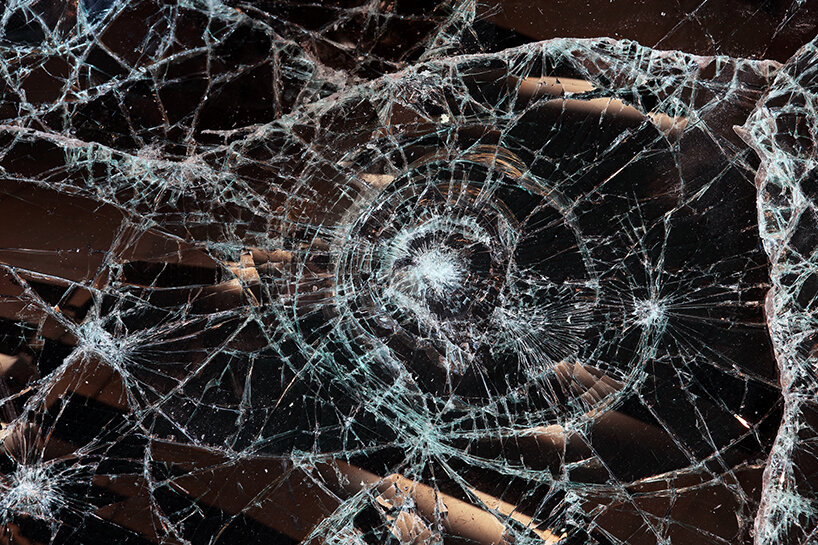 dark tide: baptiste debombourg recreates a magma flow disaster using broken black glass