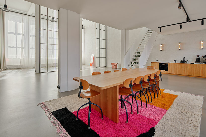step inside the minimalist interior of hamburg-based kju.studio, captured by david altrath