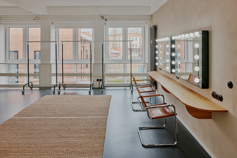 step inside the minimalist interior of hamburg-based kju.studio, captured by david altrath