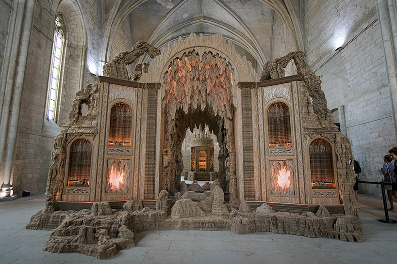 eva jospin weaves enchanting cardboard landscape into palais de papes' gothic architecture