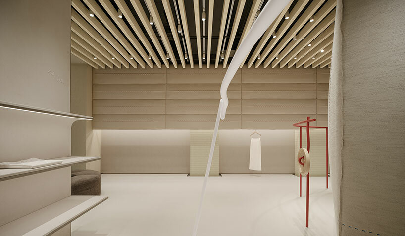 F.O.G architecture sews sculptural buttons onto lively retail interior in shanghai