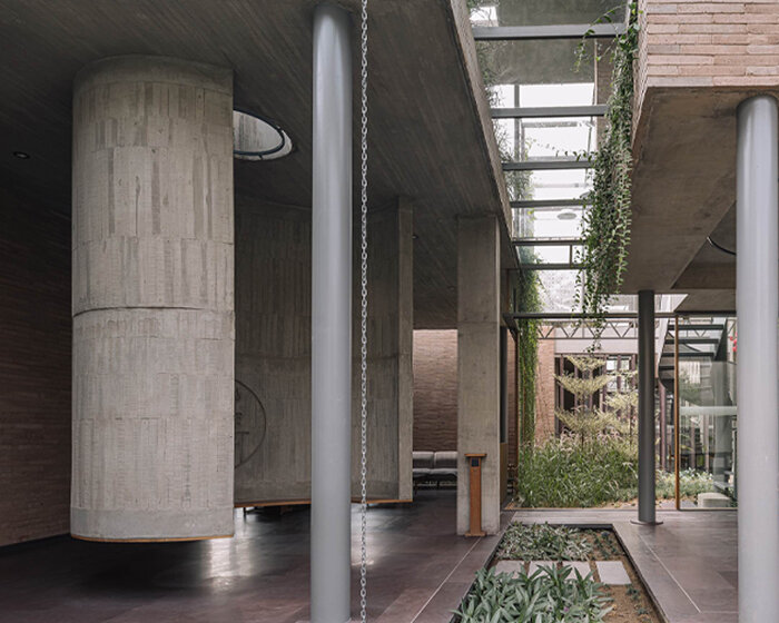 earth brick meets exposed concrete at the nature-infused 'jungalow 2' house in india