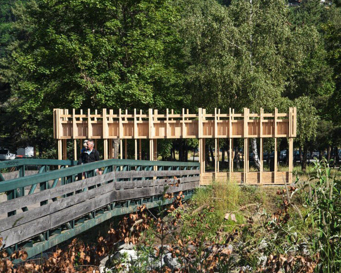 martin gaufryau's team's installation emerges as 'structural forest' of pine porticos in french park