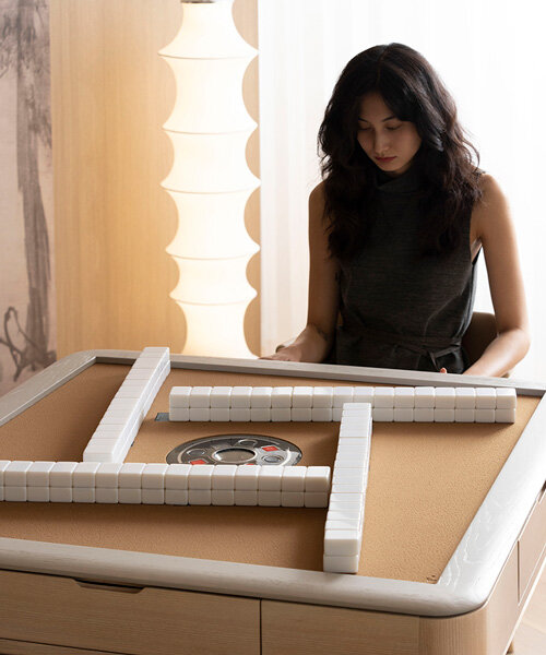 li tian's sleek mahjong table fuses traditional chinese culture with modern technology