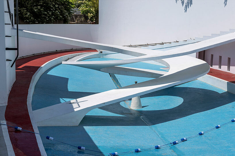 danica o. kus captures interwoven spiral ramps of modernist penguin pool at london zoo