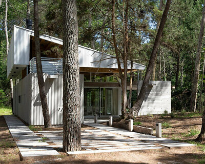 mobile wood and metal structures enable flexibility at estudio galera's buenos aires home