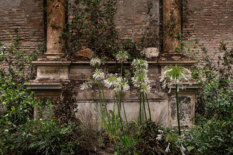 precious okoyomon adorns ancient roman church with poisonous flowers & black butterflies