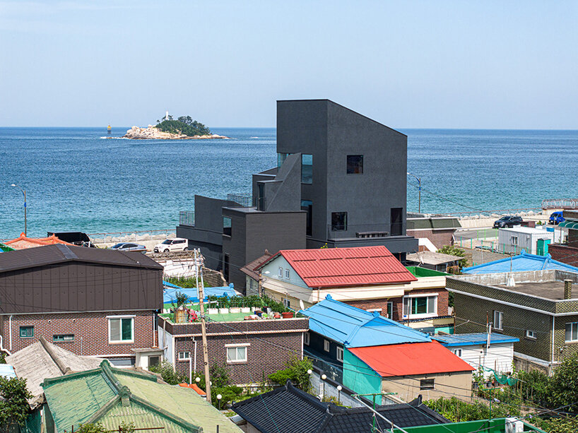 WGNB's SHLTR café in south korea reveals cavernous courtyards and interiors