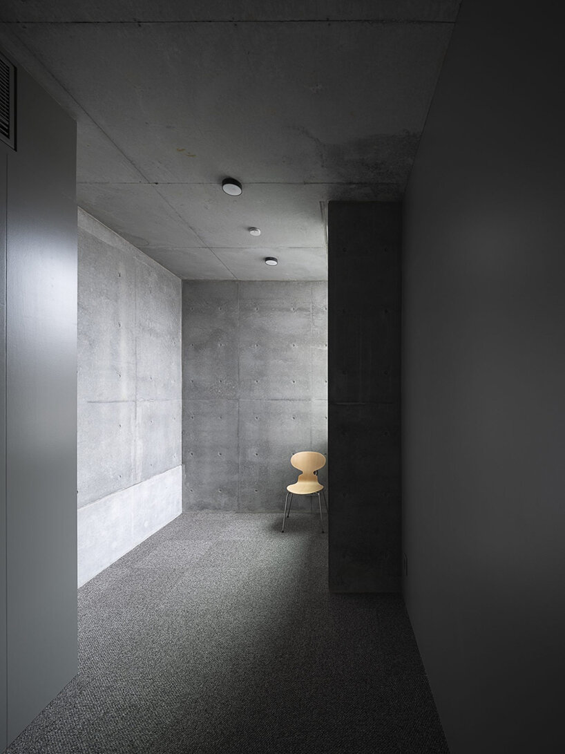 K+S architects fronts home-office in japan with textured concrete evoking geological layers