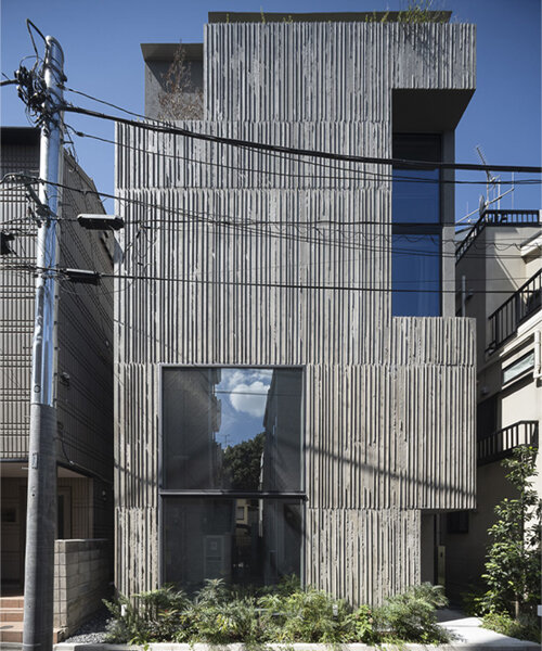 K+S architects fronts home-office in japan with textured concrete evoking geological layers