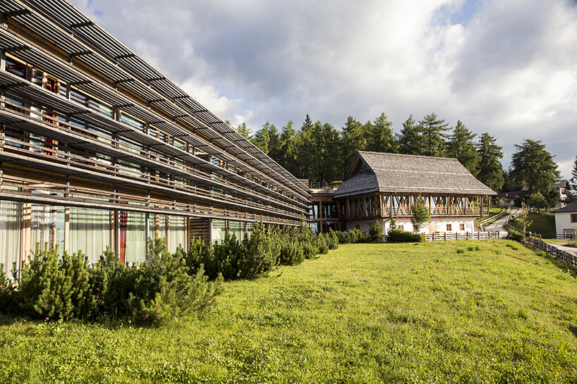 matteo thun's vigilius mountain resort lies amid the tyrolean forest, like a fallen tree