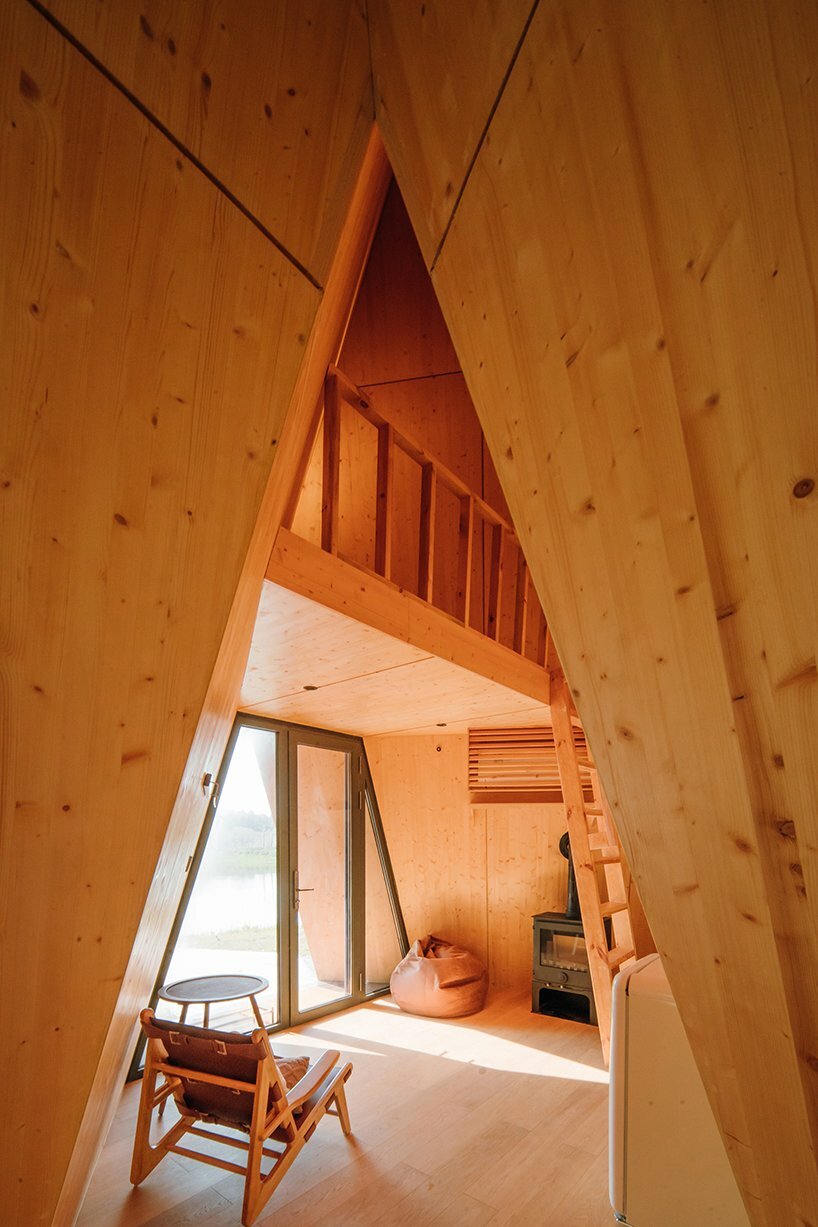 into the woods or out in the desert, how cabins employ unique forms to blend into nature