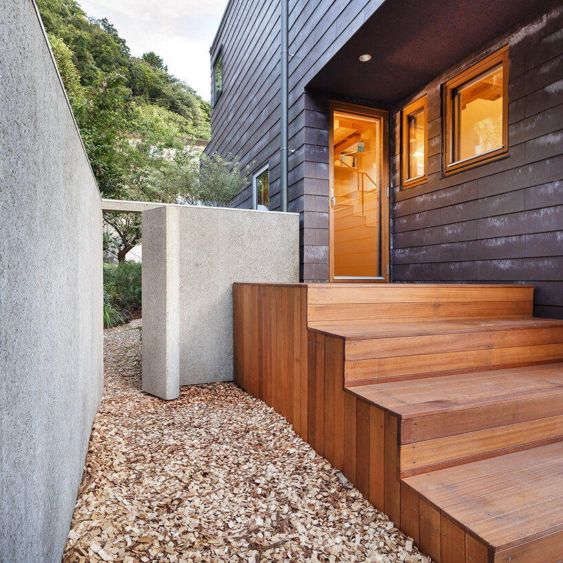 built for cats, tan yamanouchi's japanese home unfolds around a playful spiral staircase