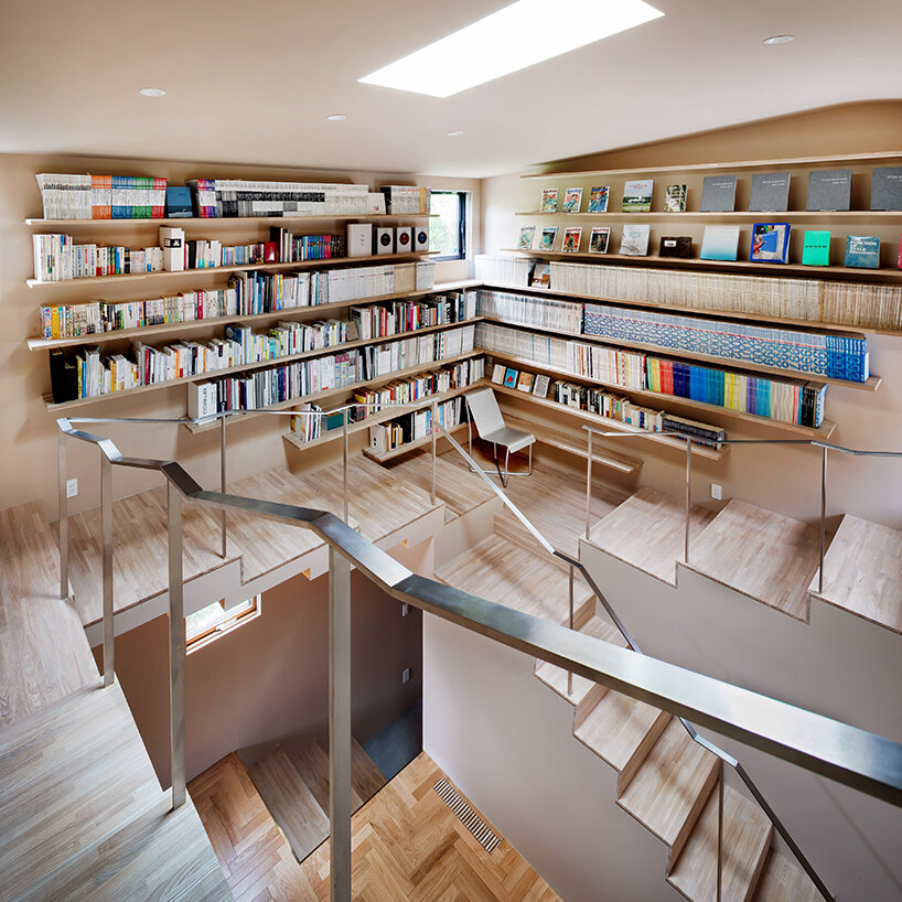 built for cats, tan yamanouchi's japanese home unfolds around a playful spiral staircase