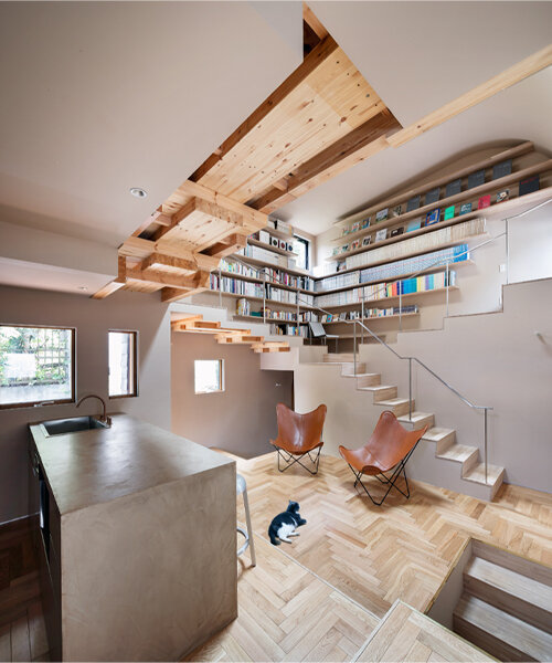 built for cats, tan yamanouchi's japanese home unfolds around a playful spiral staircase