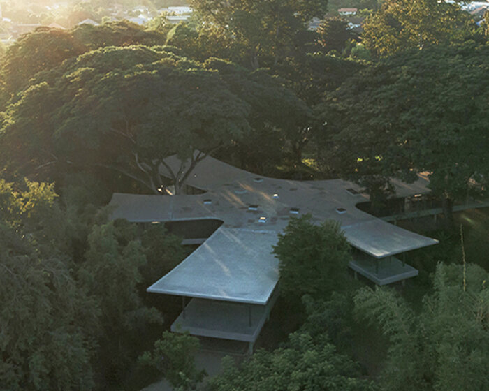 all(zone) joins five curved wings to compose 'under the rain trees' house in northern thailand