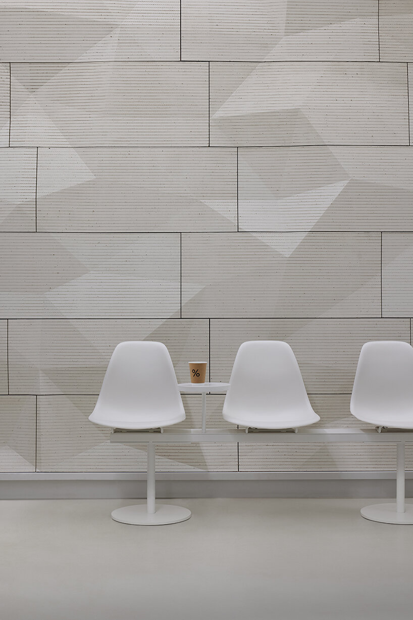 % arabica's flagship in toronto reveals faceted walls inspired by glacial and rock formations