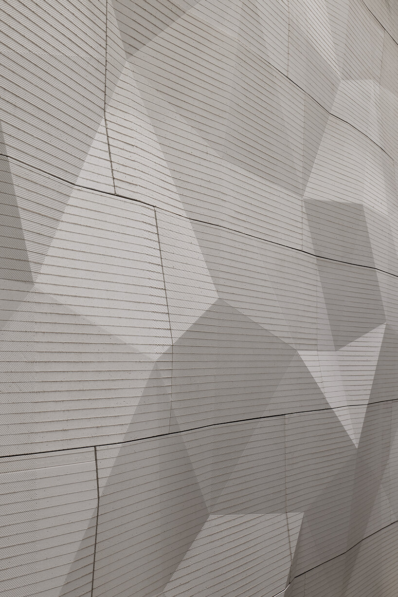 % arabica's flagship in toronto reveals faceted walls inspired by glacial and rock formations