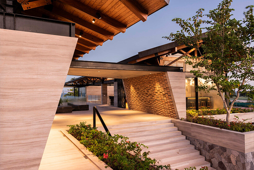 yacht-inspired multi-generational house in mexico incorporates aerodynamic elements