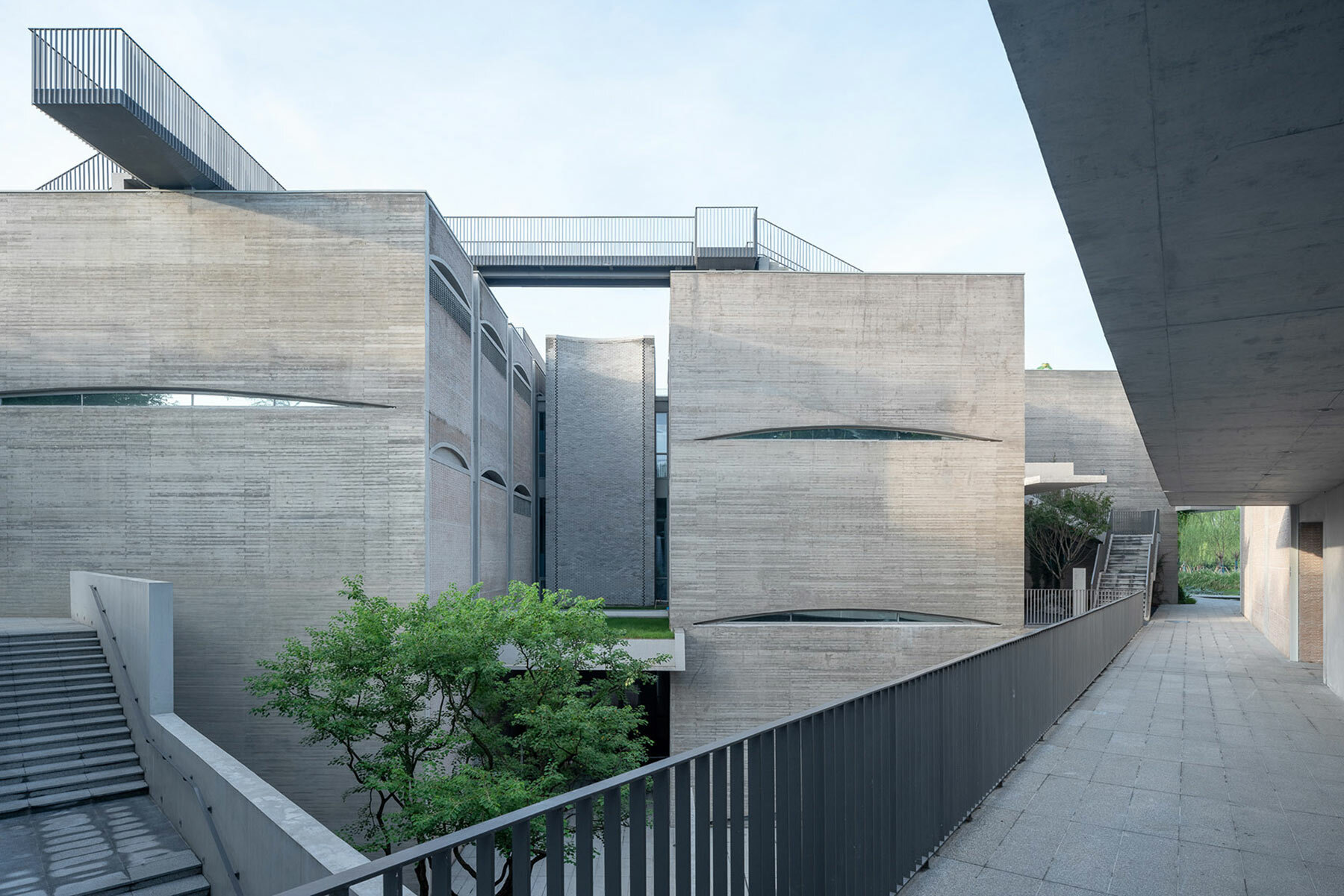 atelier FCJZ tops langtou cultural center with lotus garden roof ponds