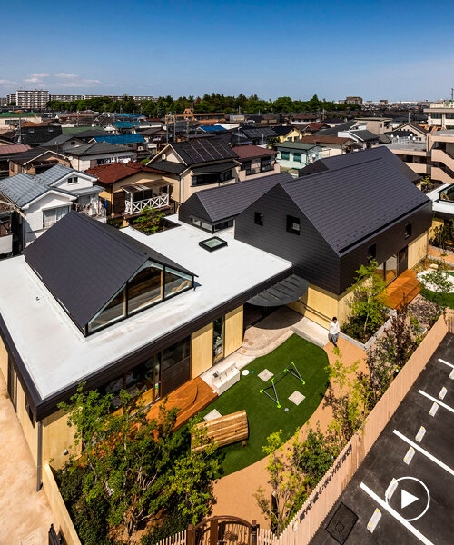 five wooden house-shaped volumes compose himawari nursery school in tokyo