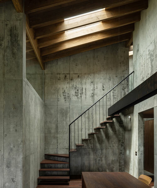 house in toguchi brings concrete architecture to lush japanese island
