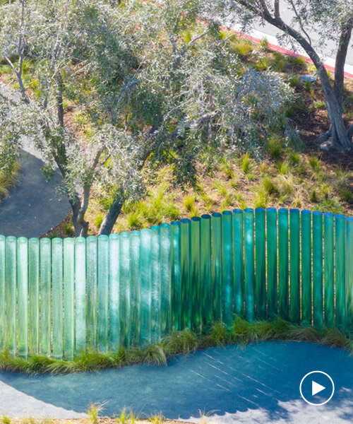 apple park's mirage sculpture takes shape as iridescent glass pillars winding through trees