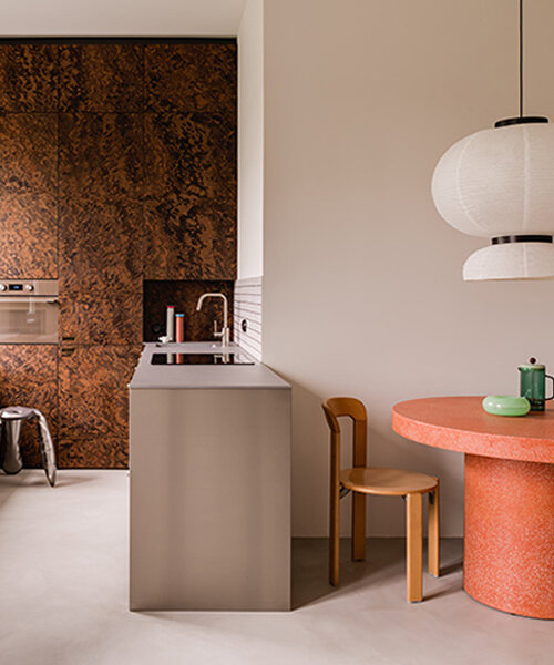 mistovia's memphis-style apartment in warsaw blends pink terrazzo, steel & walnut burl