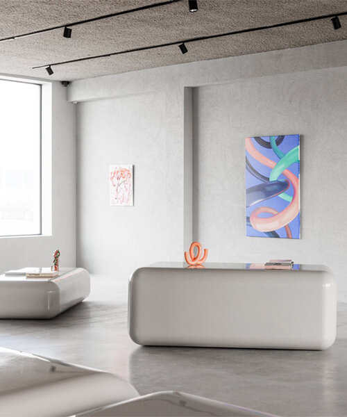 a minimalist concrete haven, oever gallery by 5AM recalls belgium's urban coast