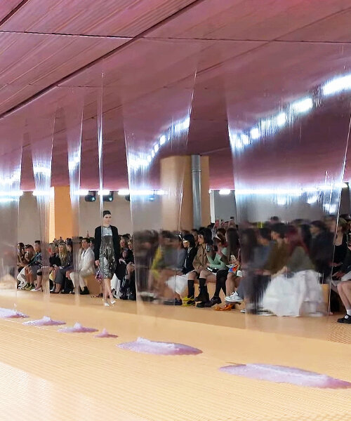 prada SS24 womenswear show sees slime dripping from the deposito's pink-hued ceiling
