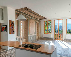 old french house's renovation revives intricate wood flooring and wall frescoes