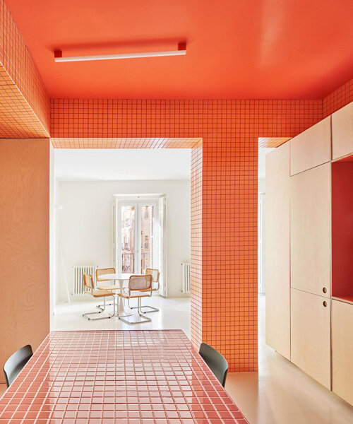 three vibrant tiled blocks infuse pops of color into tiny madrid apartment
