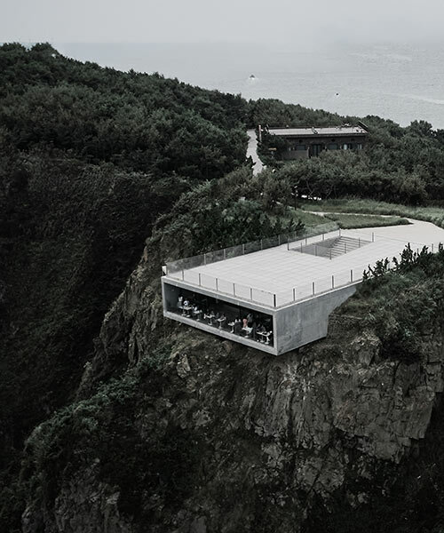 TAO embeds minimalist cliff café and tower house into a rocky island coast