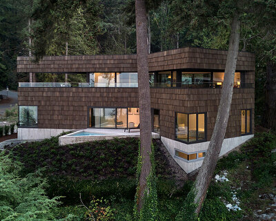 triangular pool juts out from the phoenix house celebrating the canadian coastline