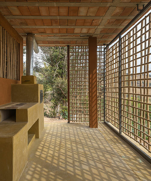 brazilian studio vazio S/A shades its 'serra house' in a facade of woven bamboo