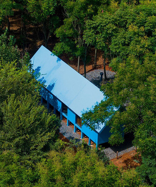 double slope roof tops wiki world's blue wooden cabin engulfed in chinese forest