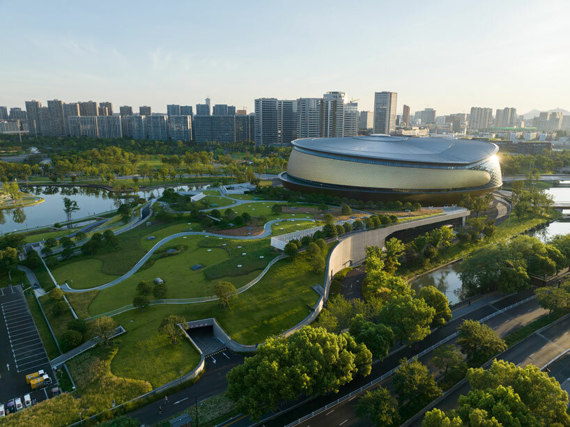 archi-tectonics hybrid stadium in hangzhou takes cues from chinese cong
