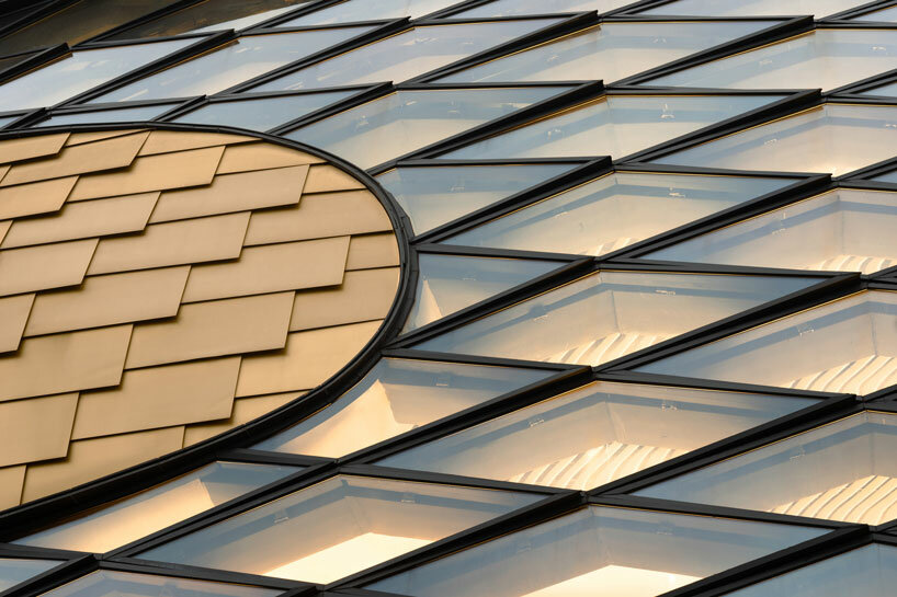 archi-tectonics' hybrid stadium in hangzhou takes cues from the chinese cong