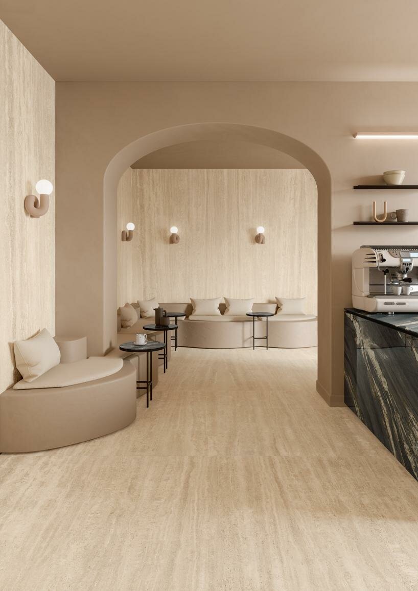 ariostea’s marmi travertino surfaces gives italian travertine stone a porcelain revival