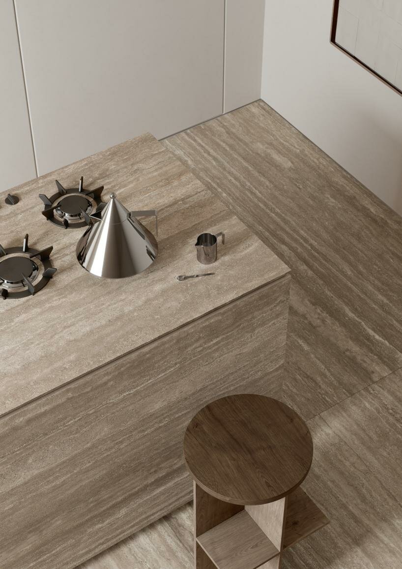 ariostea’s marmi travertino surfaces gives italian travertine stone a porcelain revival