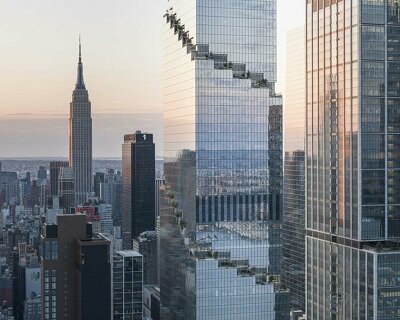 BIG's prisma towers subtly shimmer in the skyline of shenzhen