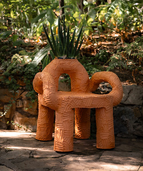chris wolston's terracotta chairs blossom among gardens at hotel bel-air