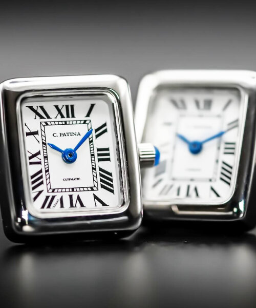 fully functional miniature luxury watches tell time and date at the shirt's cufflinks